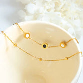 Dual Tone Roman Circle Charm Bracelet