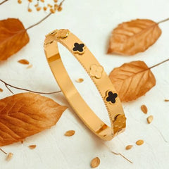 Gold Floral Motif Bracelet with Black Enamel Accents