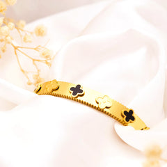 Gold Floral Motif Bracelet with Black Enamel Accents