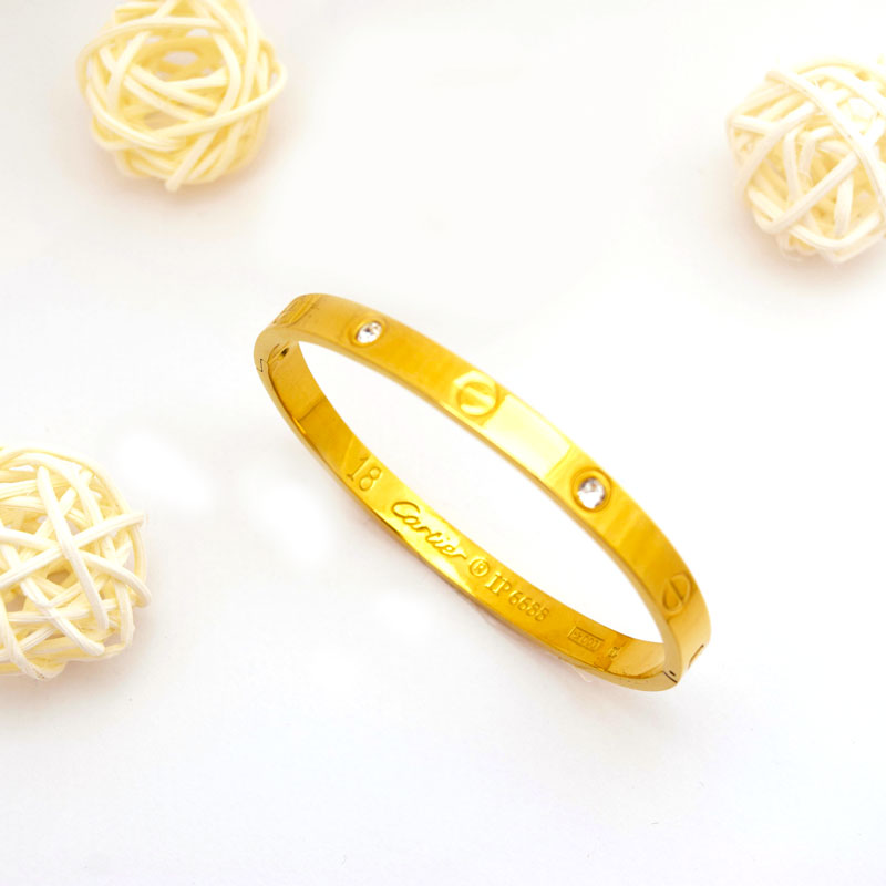 Classic Screw Motif Gold Bangle with Crystals