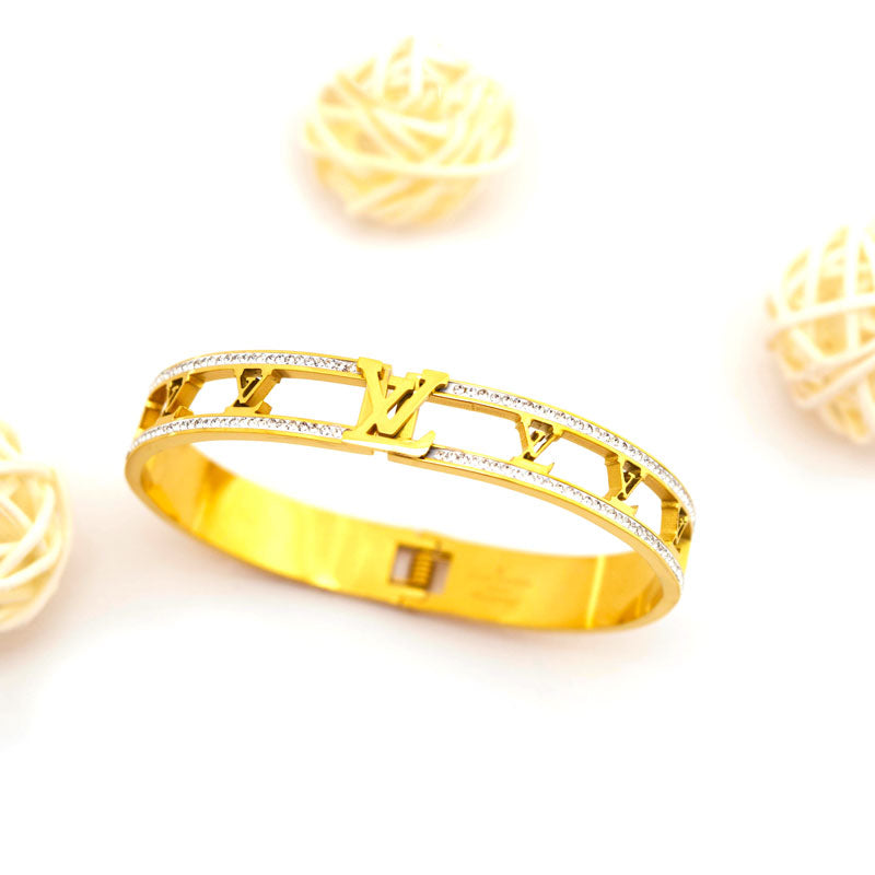 Golden Monogram Statement Bracelet