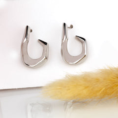 Sculpted Wave Silver Hoop Earrings